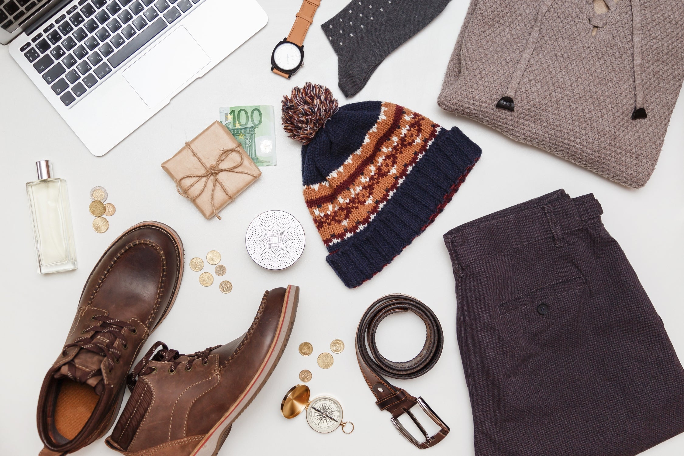 Flat lay of winter accessories and fashion items as a luxury gift for him.