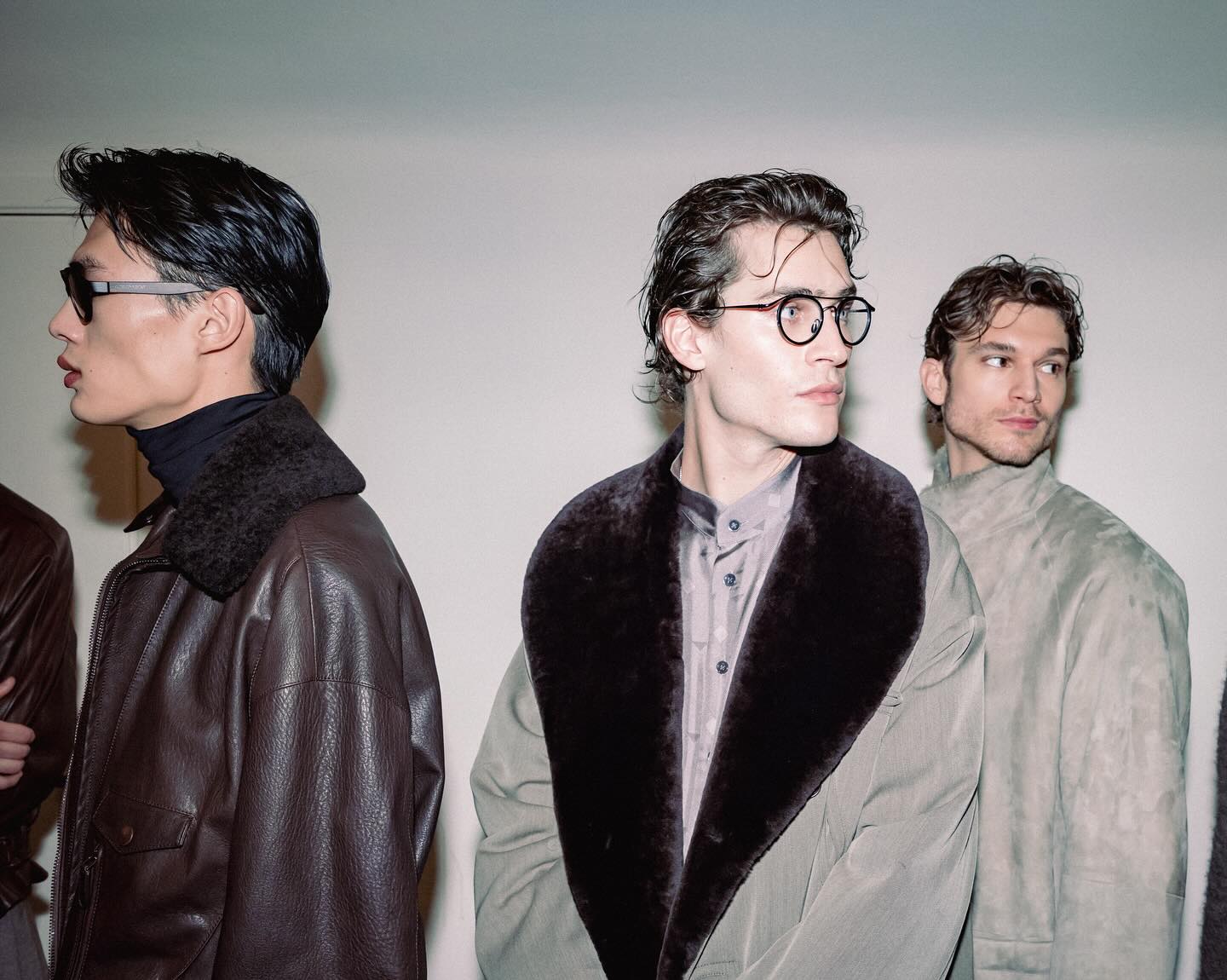 Milan Fashion Week Men’s 2026 models showcasing modern tailored outerwear and runway style.