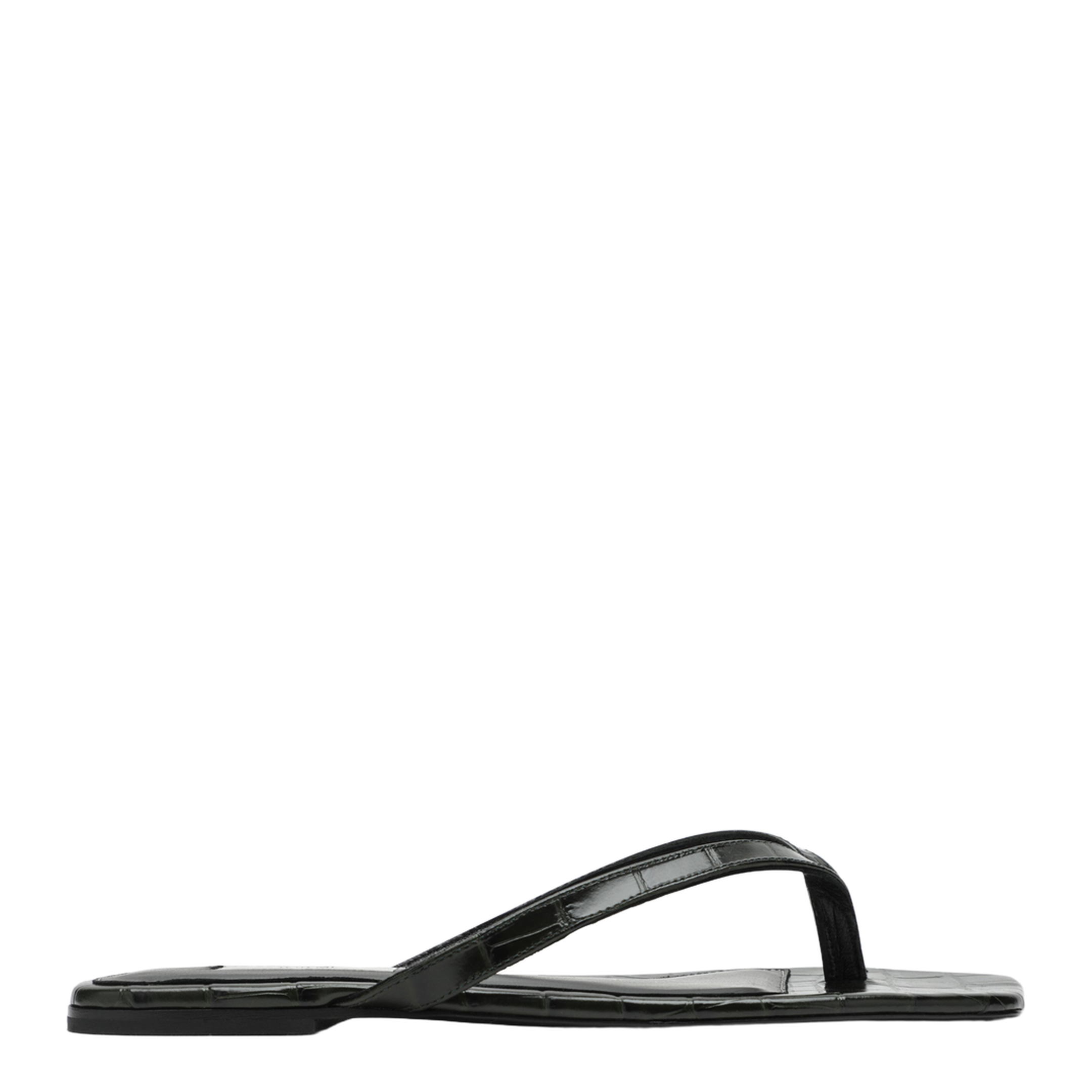 Crocodile-effect leather flip-flops in green