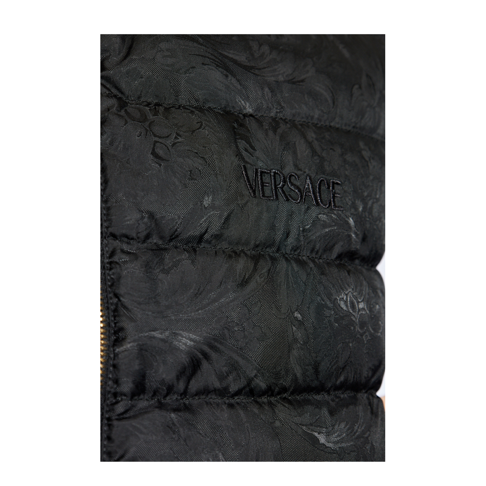 Down Vest with a Stand-Up Collar