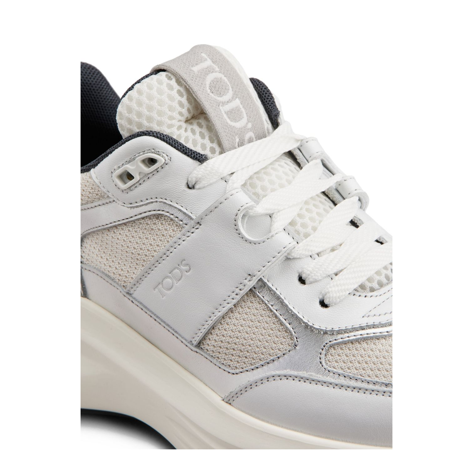 Sneakers in Leather and Fabric