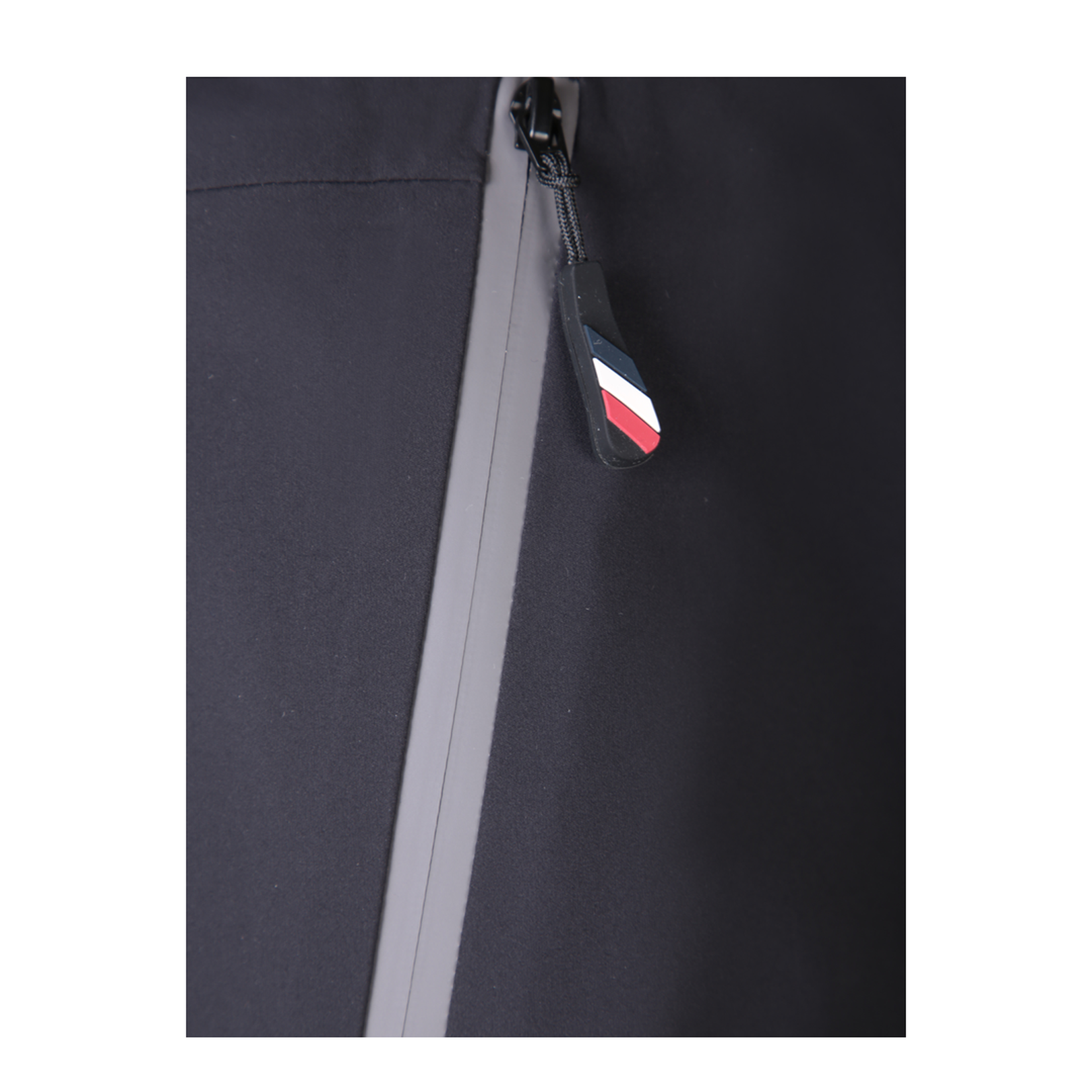 Ergonomic design, use of technical fabric, zippered pockets.