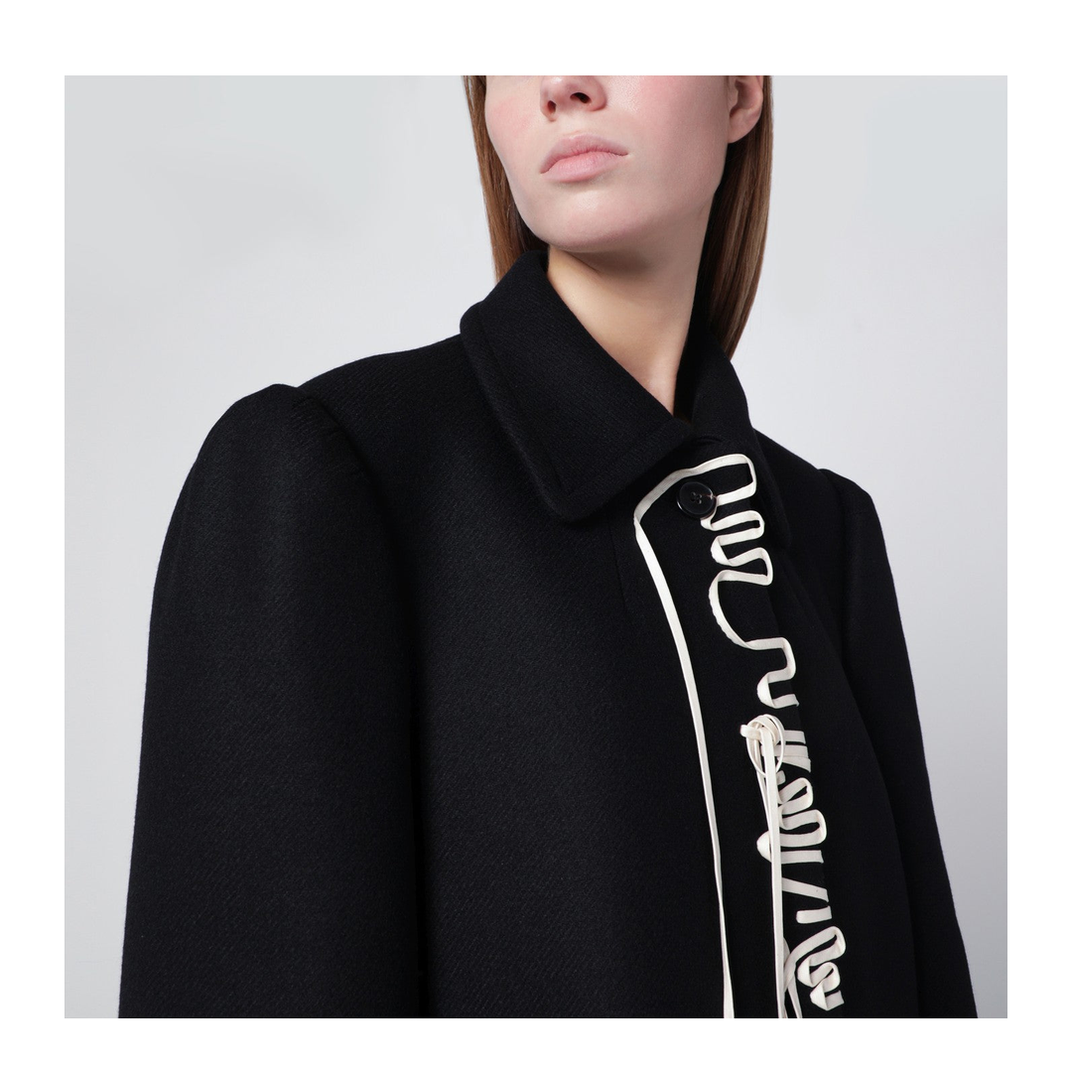 Black coat with embroidery detail