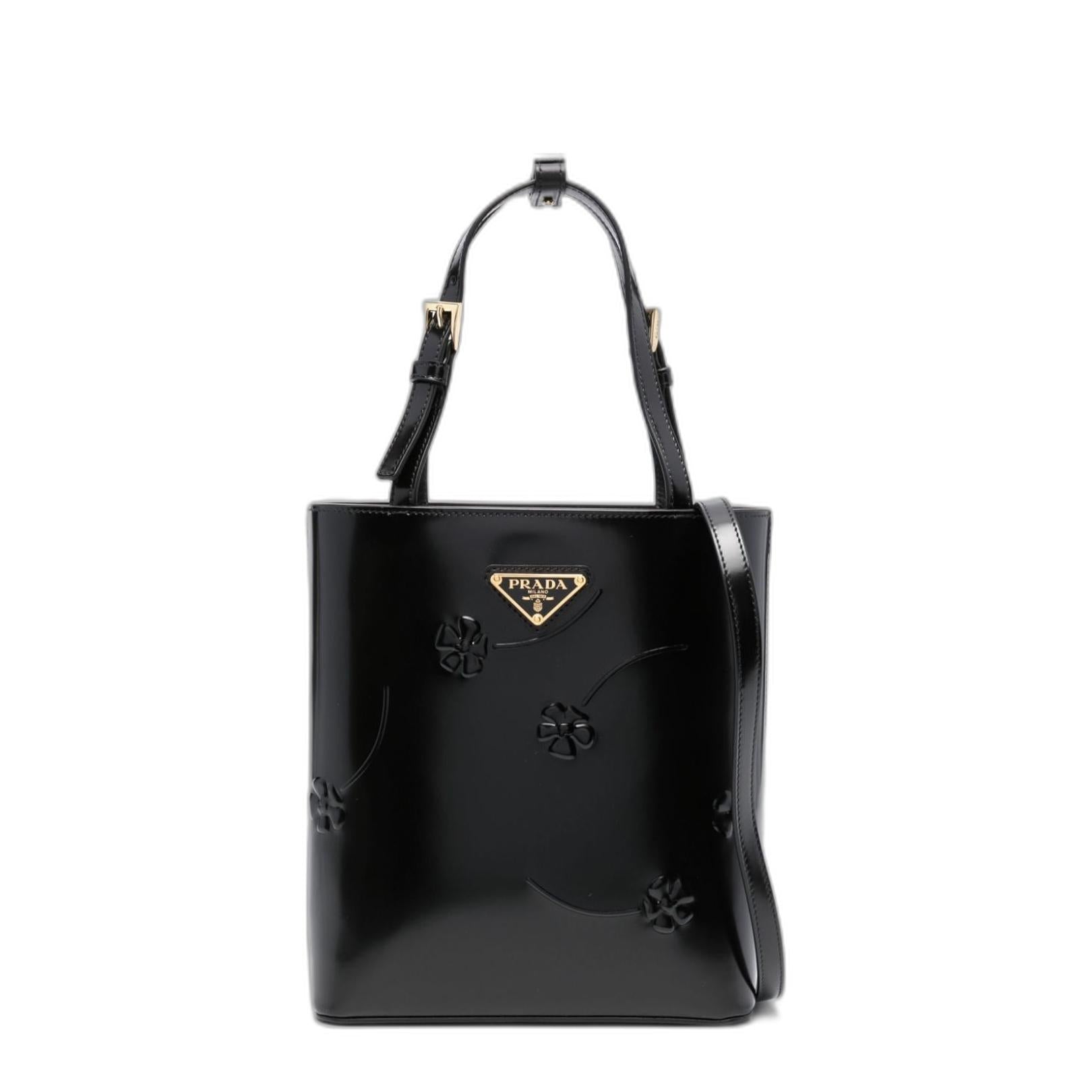 徽标三角形花卉压花手提包