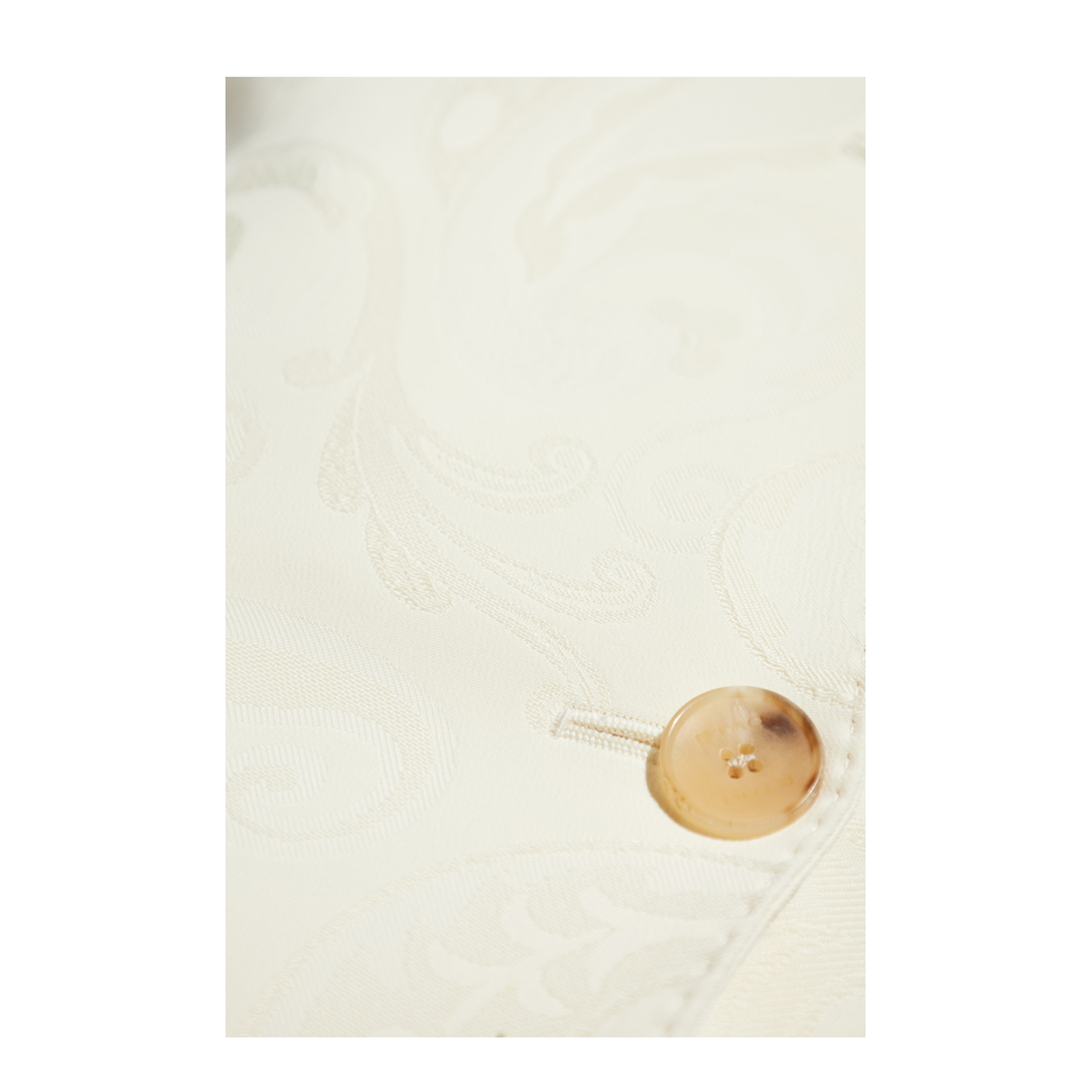 Vest with decorative draping at the back