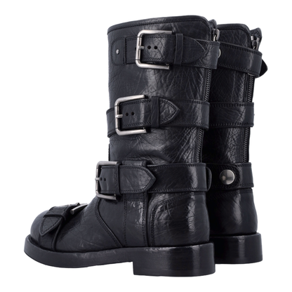 Black leather boots with straps