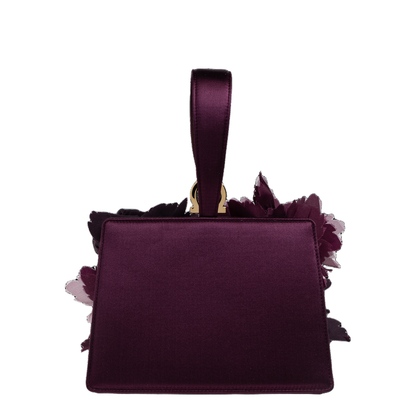 Handbag with appliqués