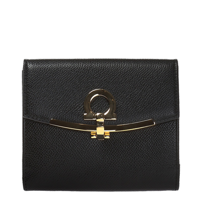 Wallet with a decorative clasp