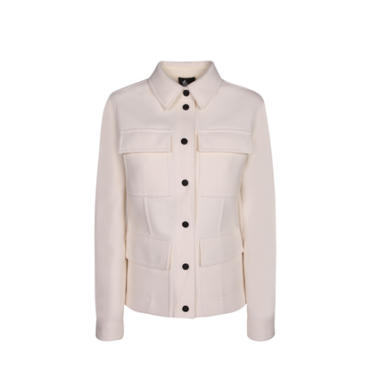 Shirt collar. Front closure with contrasting black buttons. Flap pockets on the chest.