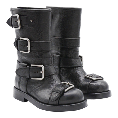 Black leather boots with straps