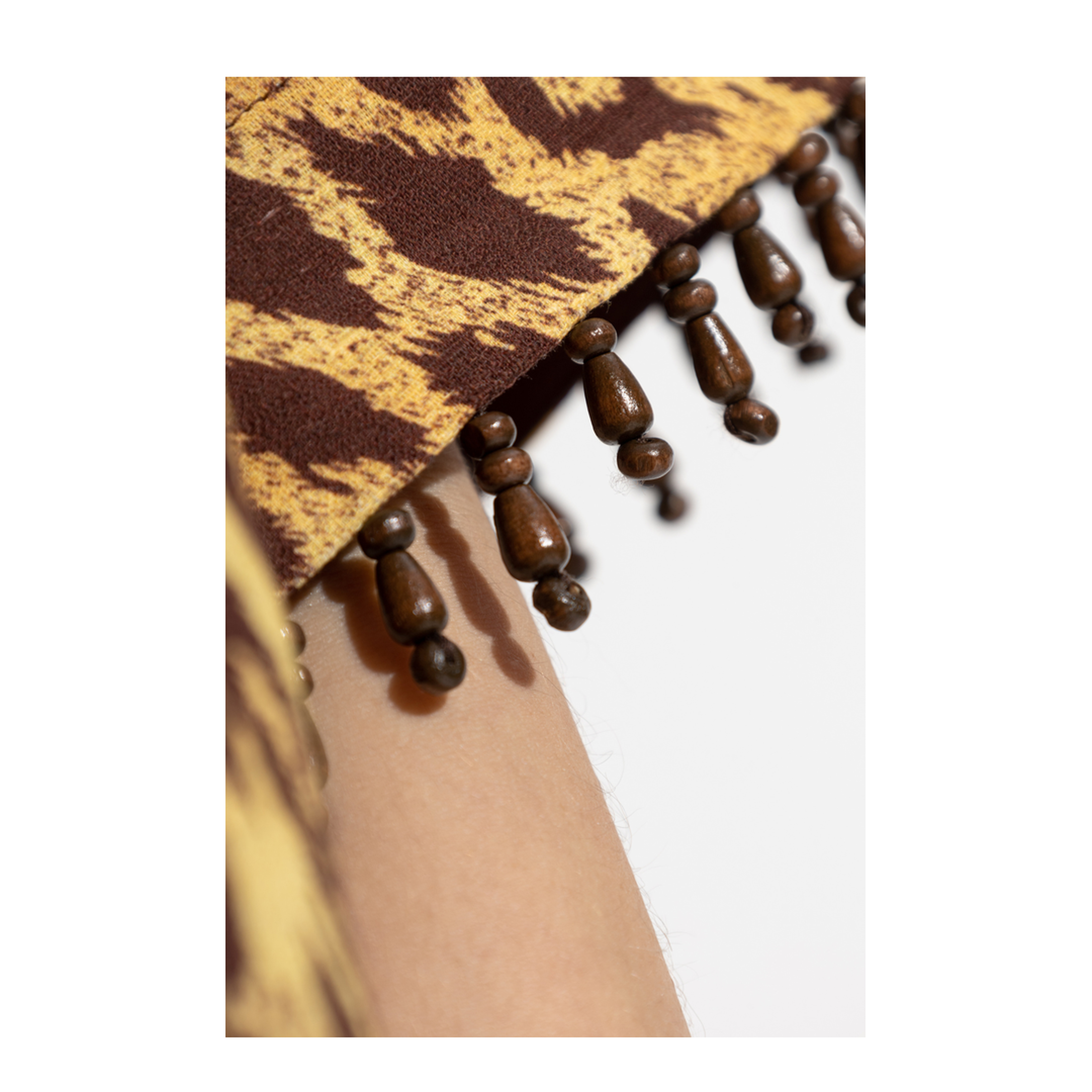 Shirt with decorative beads