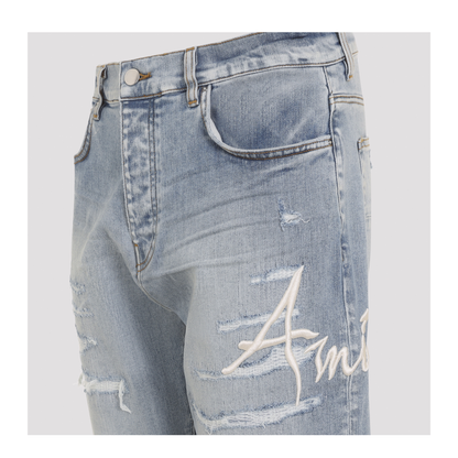 MAYFEYR - Amiri - Repaired Slim Jeans - AMBMJE1060