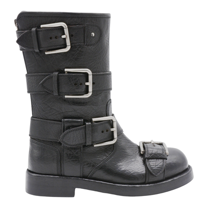 Black leather boots with straps