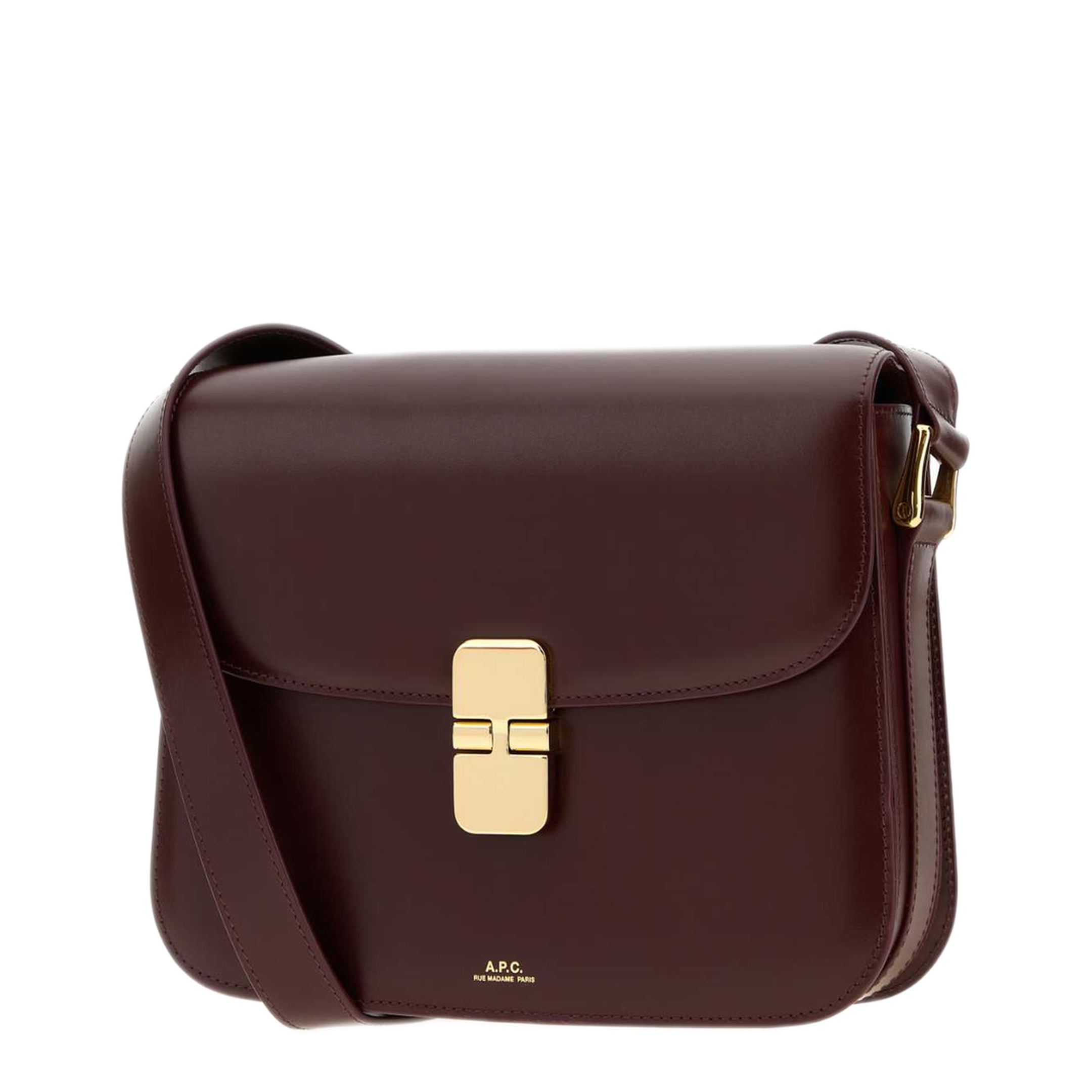 Three-quarter view of a grape A.P.C. Grace bag highlighting its smooth leather, side ring and gold-tone closure.