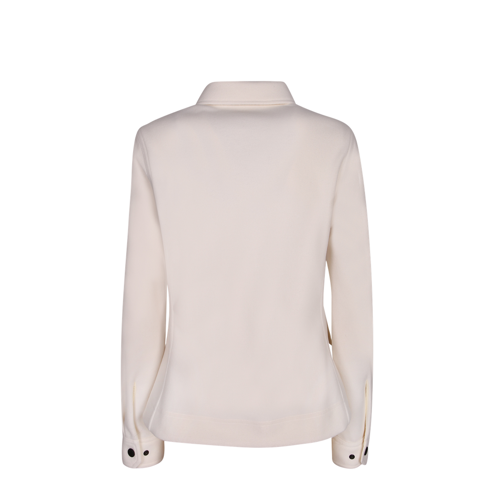 Shirt collar. Front closure with contrasting black buttons. Flap pockets on the chest.