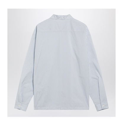 White and light blue striped zip-up shirt