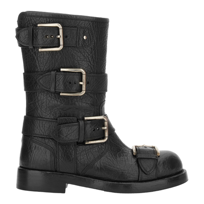 Black leather boots with straps