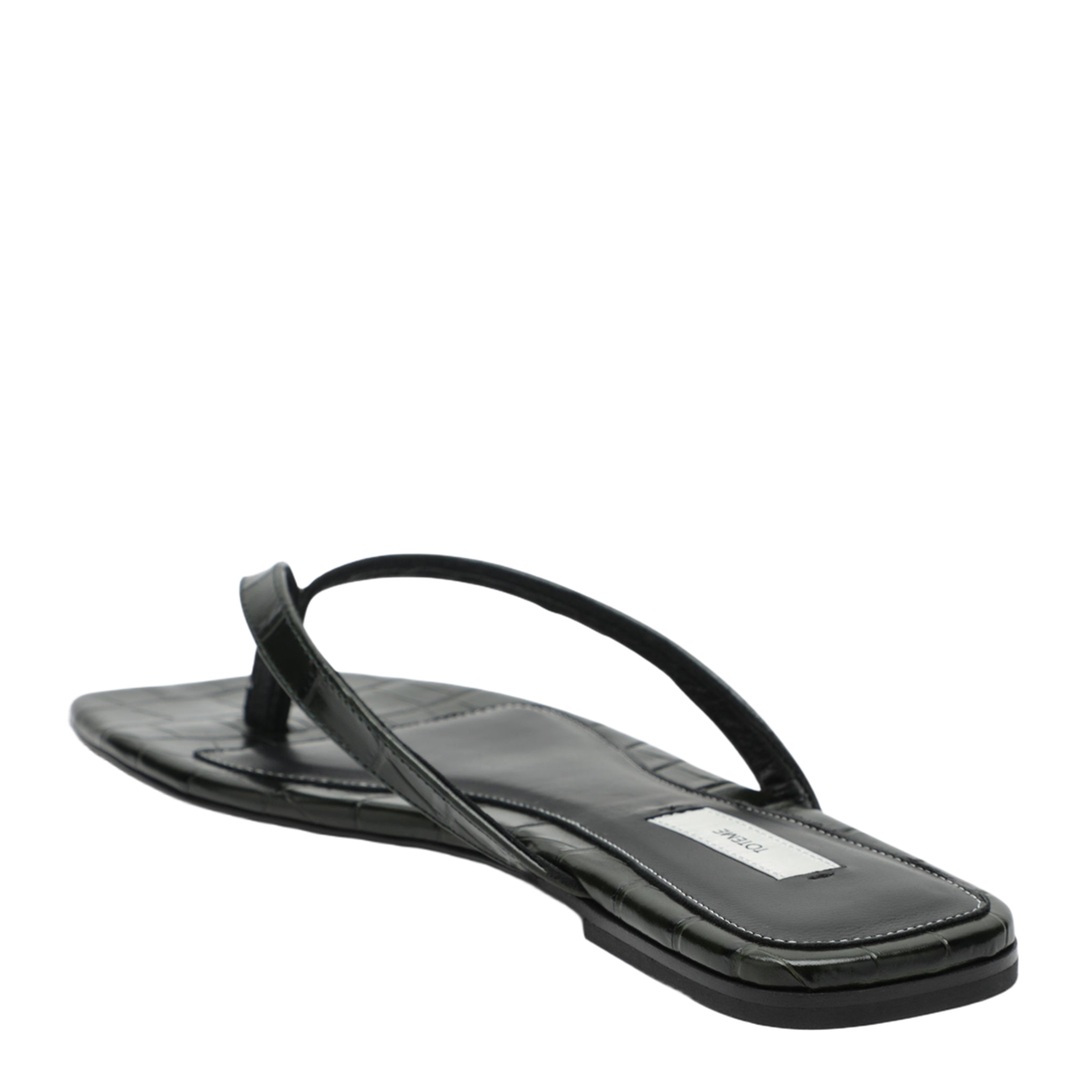Crocodile-effect leather flip-flops in green
