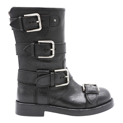 Black leather boots with straps