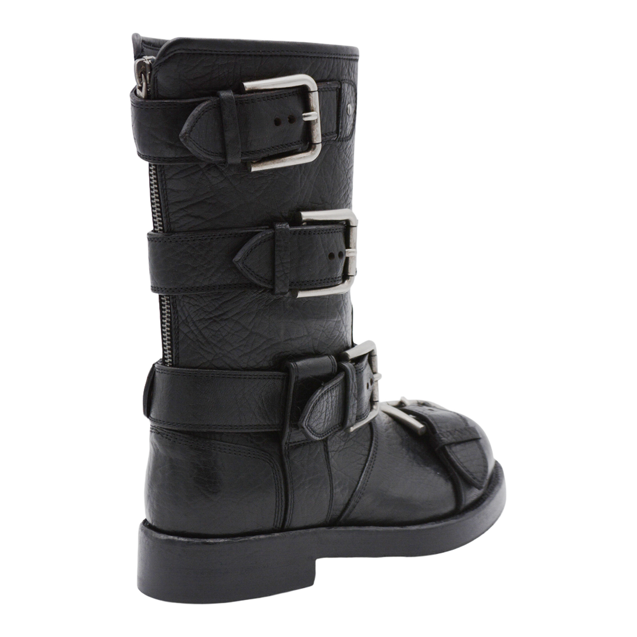 Black leather boots with straps