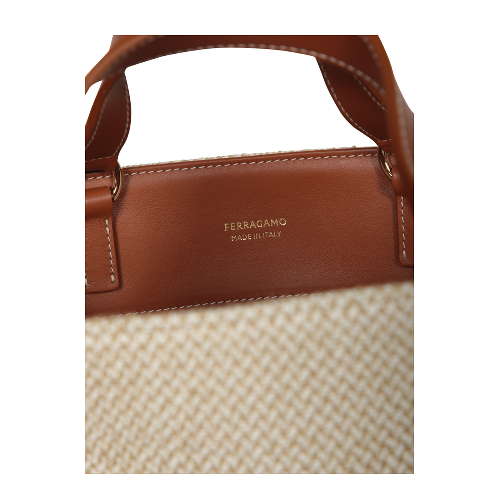 Jacquard fabric tote bag with leather details. Top handles and printed  logo.