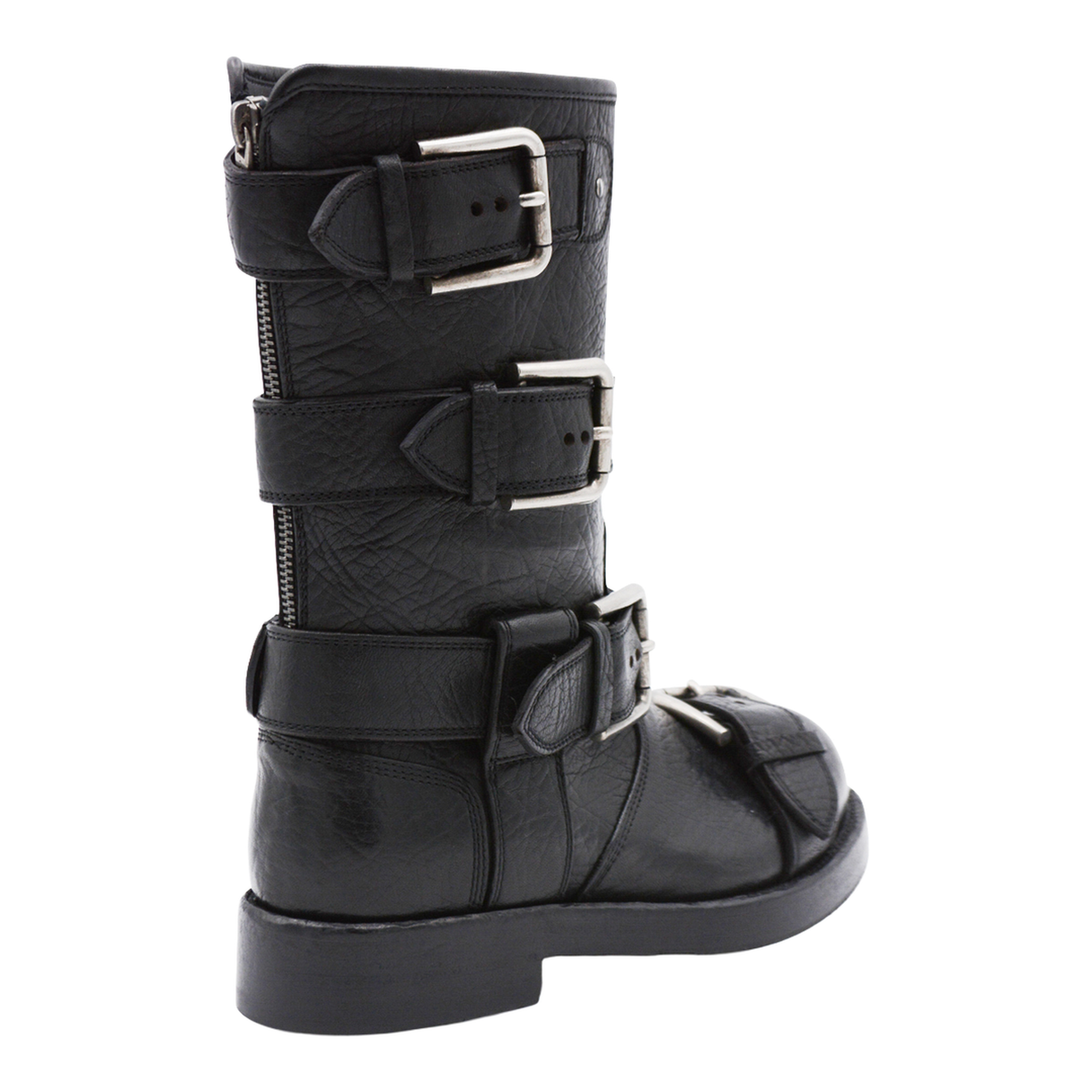 Black leather boots with straps