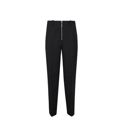 Adjustable drawstring waist. Tapered cut. Front zip closure. Side pockets.