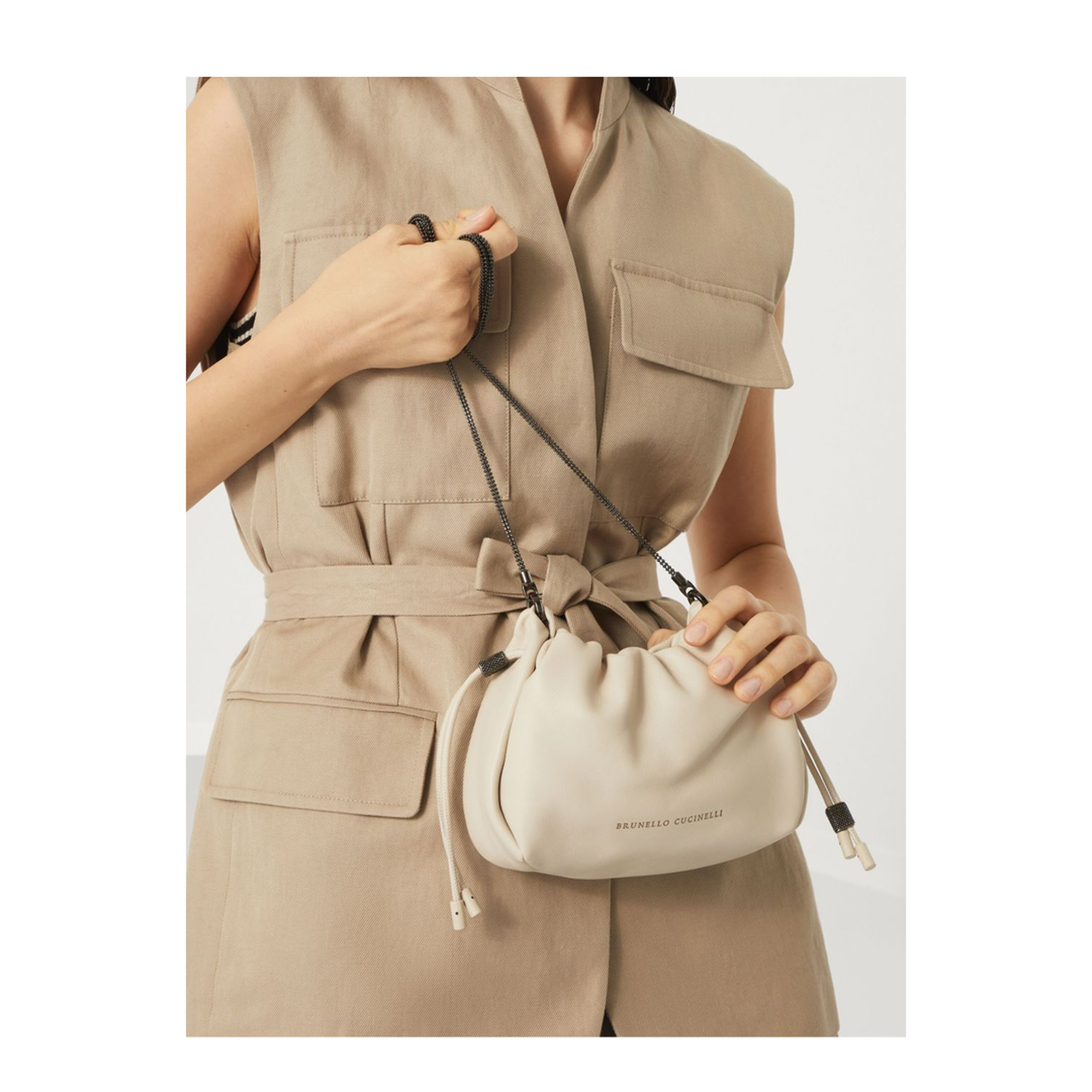 Mellow Beige Crossbody Bag with Drawstring Closure and Chain Shoulder Strap