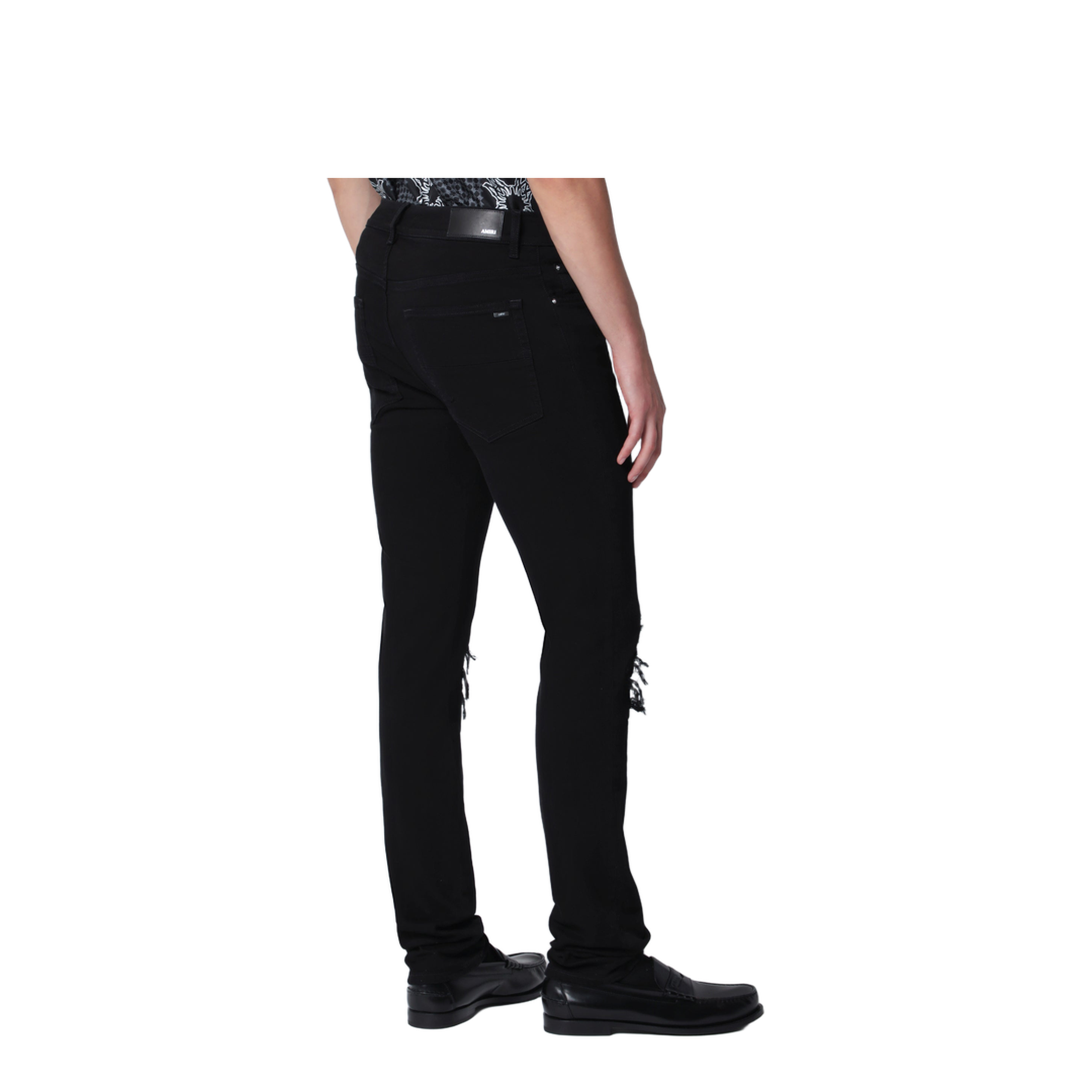 MAYFEYR - Amiri - Ripped Skinny Cotton Jeans In Black - AM5JE002DE00CO