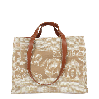 Jacquard fabric tote bag with leather details. Top handles and printed  logo.