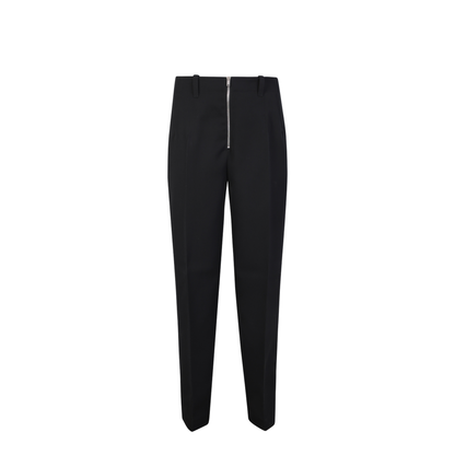 Adjustable drawstring waist. Tapered cut. Front zip closure. Side pockets.