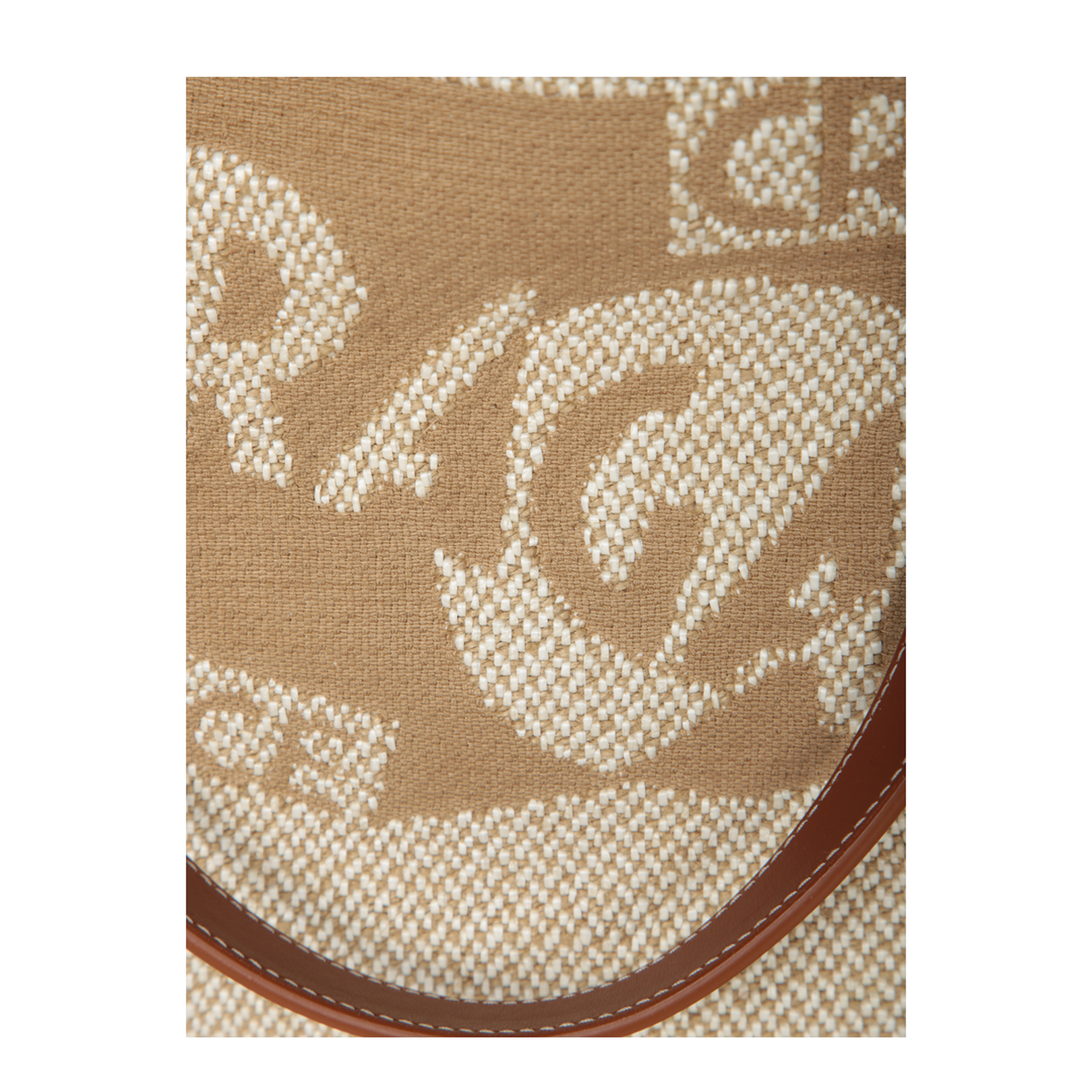 Jacquard fabric tote bag with leather details. Top handles and printed  logo.