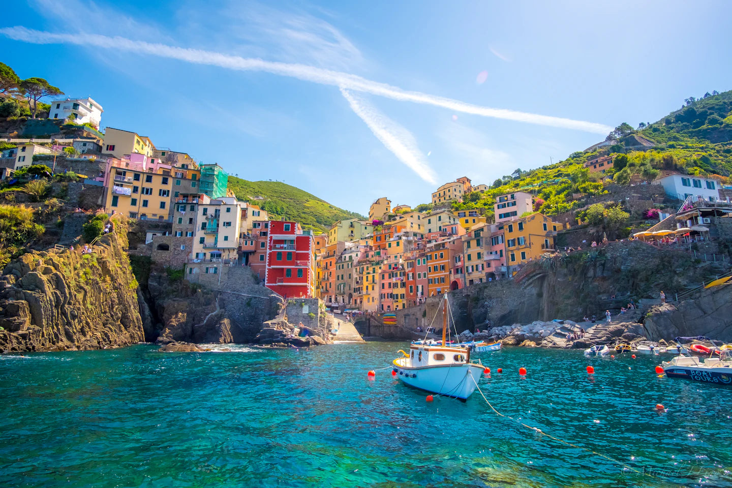 Colourful waterfront houses and fishing boats in Cinque Terre, Italy